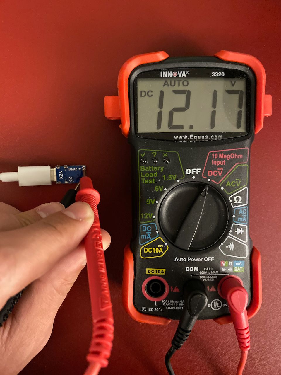 multimeter connected to the ZYPDS showing 12.17V